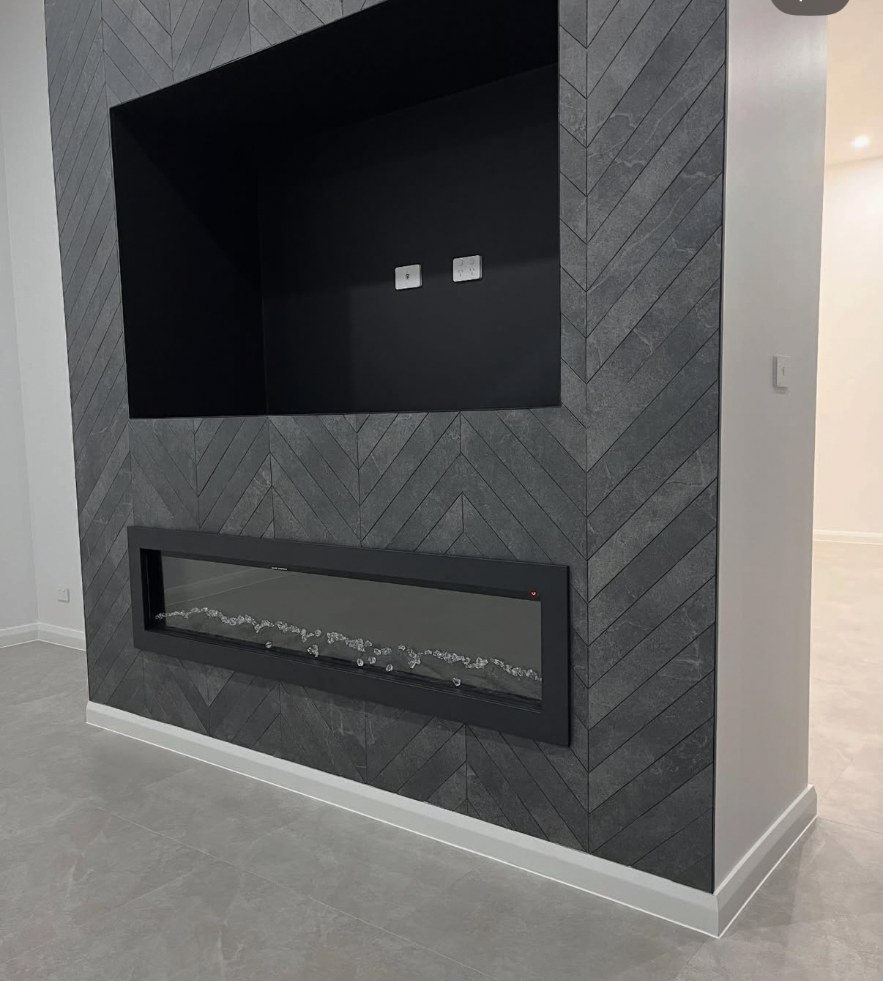 Chevron stone feature fireplace wall in West Pennant Hills with skirting and tile expansion joints sealed